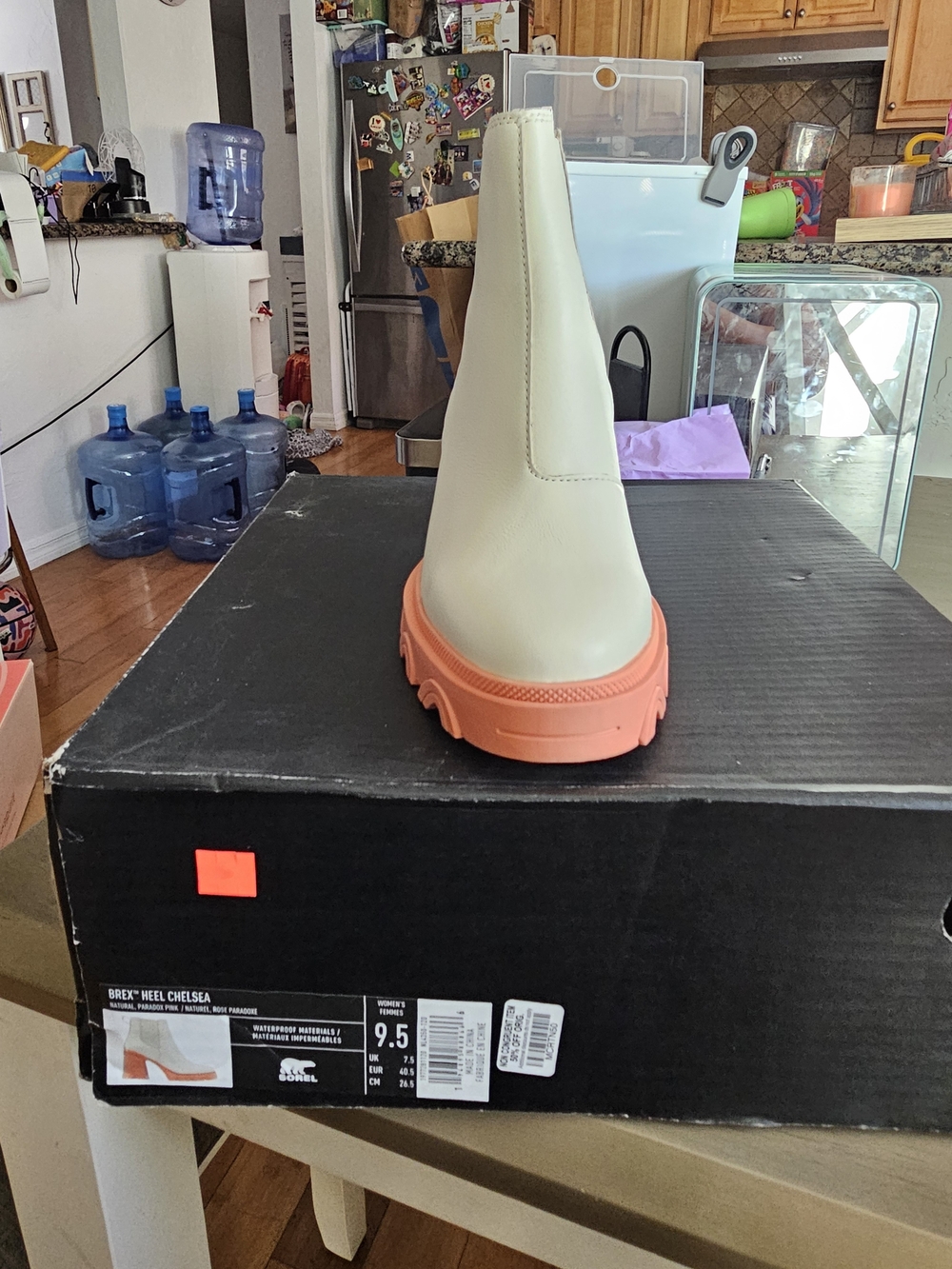 #10 Sorel Cream Chelsea Boot with Coral Orange Sole